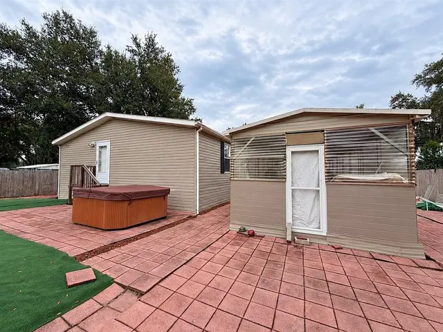 1722 Evergreen St, Kissimmee FL: backyard patio and the detached workshop